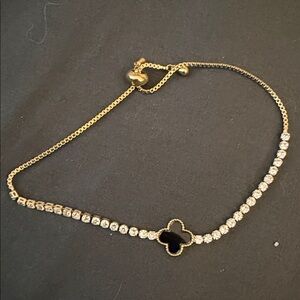 Elegant Gold and Black Clover Necklace